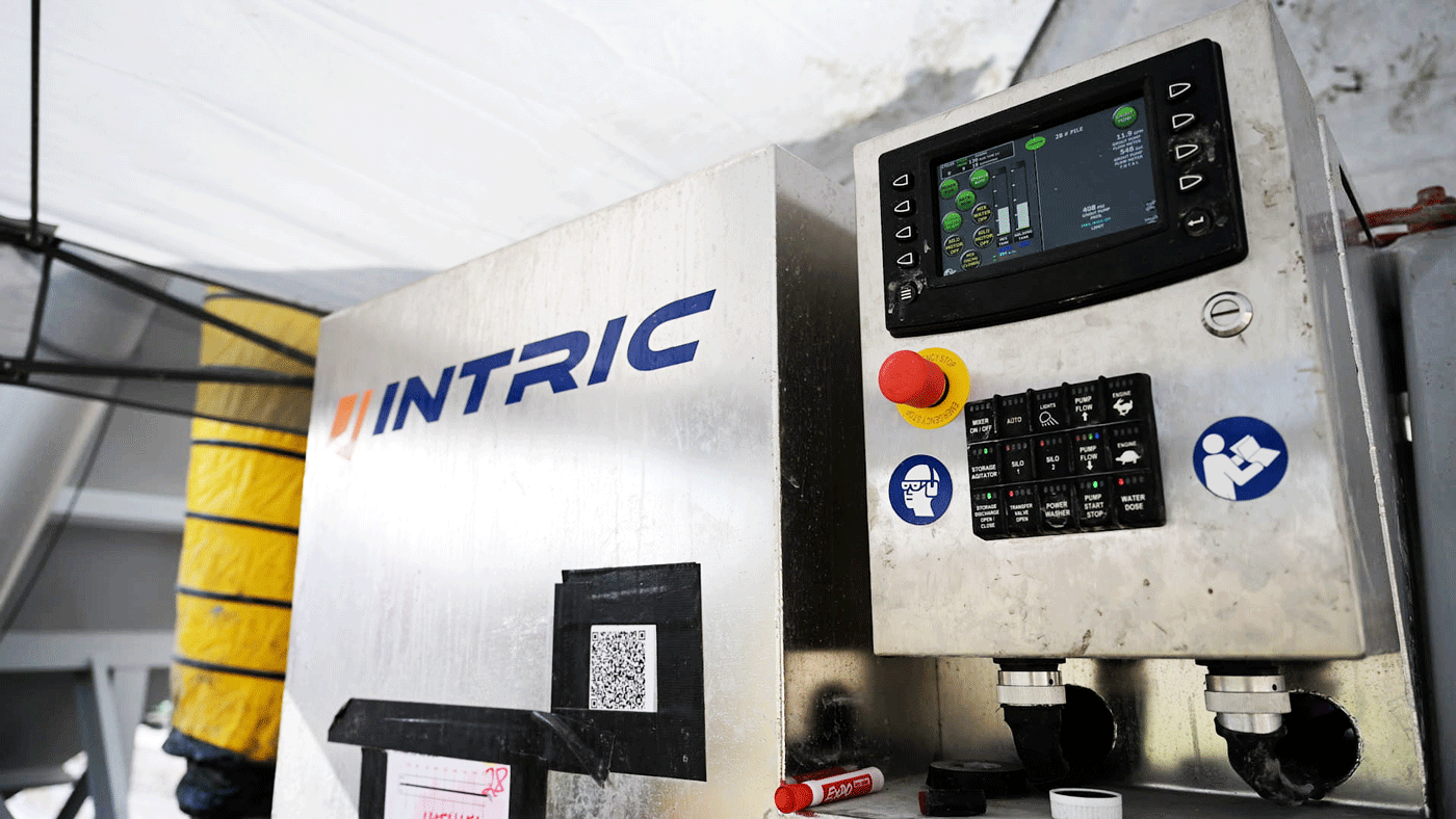 Made in the USA Intric AMS500 fully automated mixing station control cabinet with touchscreen, emergency stop, and keypad controls available for rent or purchase from National Piling Products