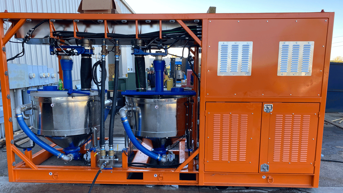 Made in the USA Intric DT650 dual-tank mixing station with orange skid frame and stainless steel high-shear mixing tanks, available for rent or sale from National Piling Products